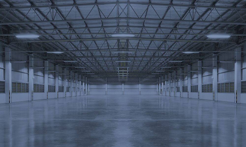 Industrial building Empty industrial building with overhead lights