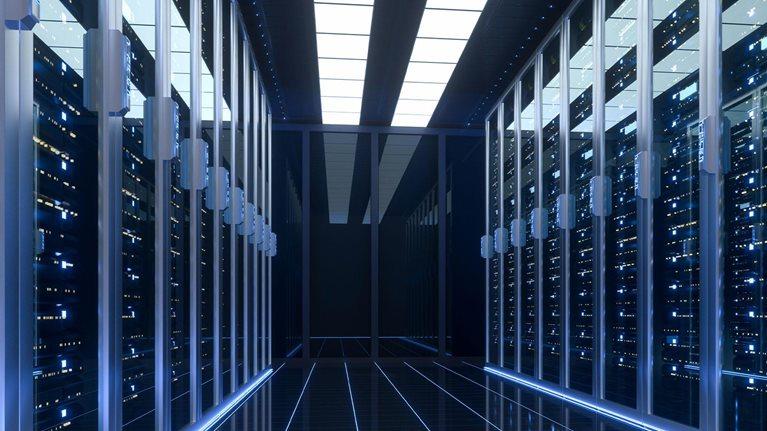 Illuminated data center server hall — AI and hyperscale infrastructure land advisory by Artemis Commercial Group
